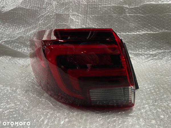 LAMPA TYŁ LEWA LED OPEL ASTRA V K 39032038