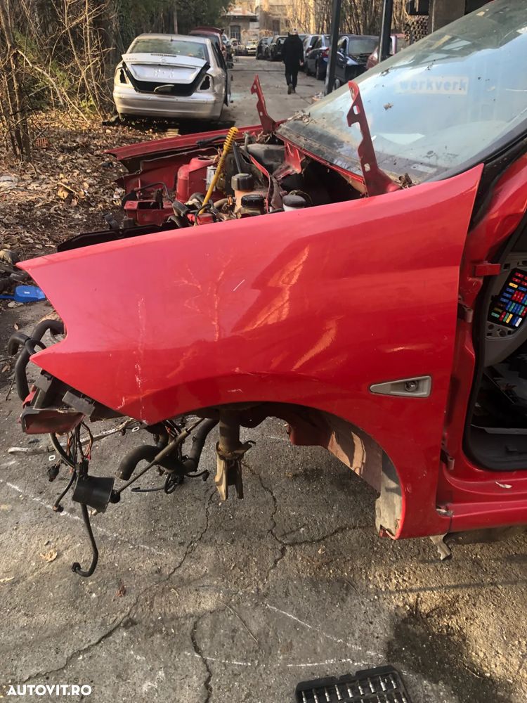 Aripa stanga fata Renault Clio Thalia 2011 rosu - 5