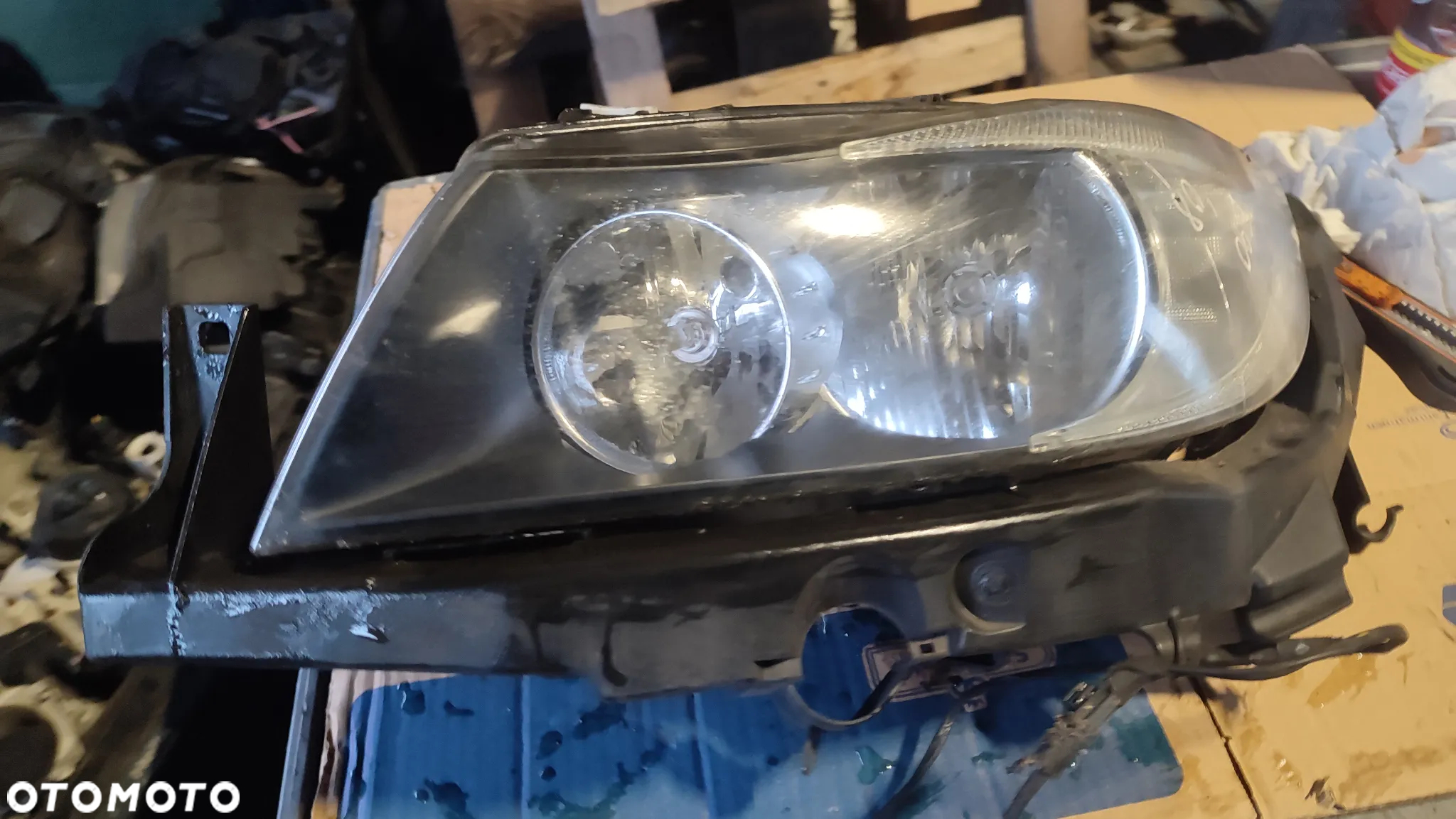 Lampa lewy przód  BMW 3 E90 E91 05- 6942723 ANGLIK - 2