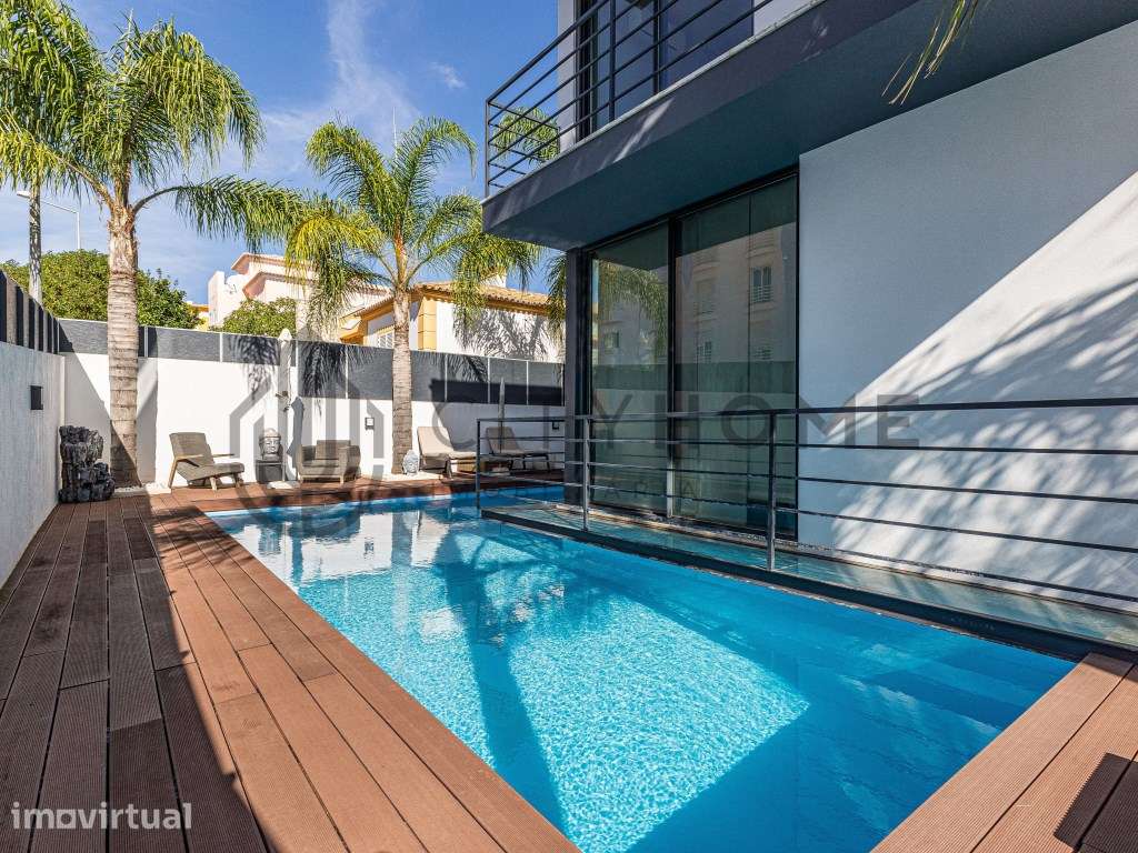 Moradia moderna T4+1 isolada, com piscina e cave - Grande imagem: 2/46