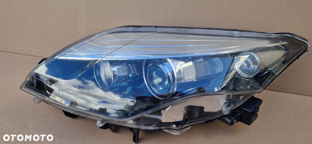 Renault Laguna III xenon lewa lampa LIFT 260601102R Europa - 2