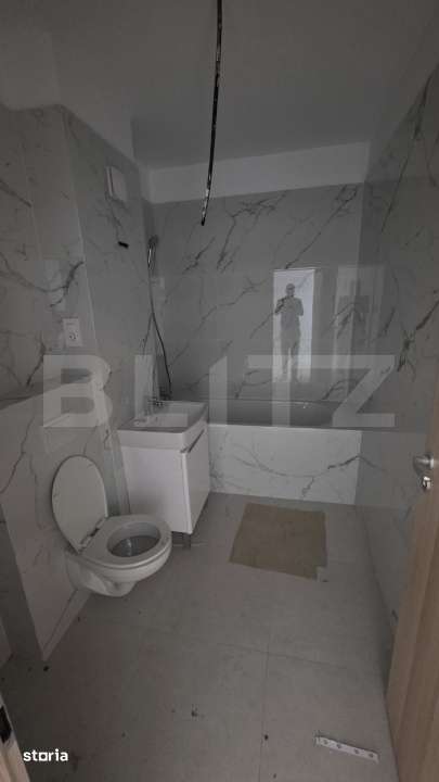 Apartament 2 camere, decomandat, etaj 3, parcare subterana inclusa — fotografia 3
