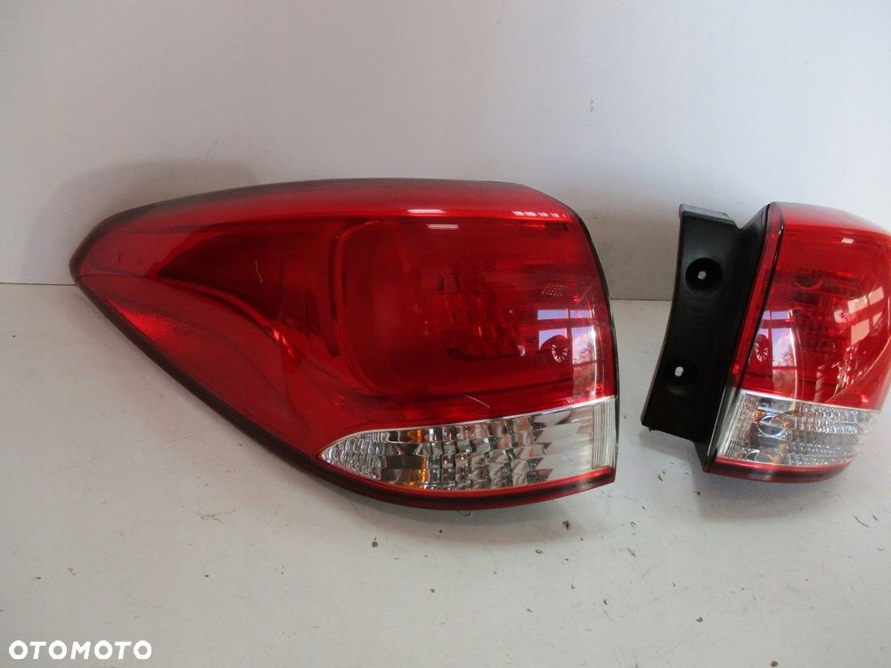 Lampa KIA CARENS 15r LEWA - 3