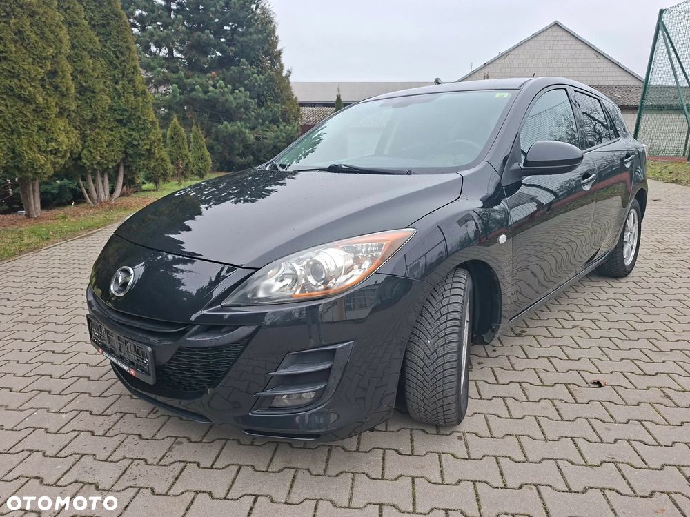 Mazda 3 2.0 MZR DISI Sports-Line - 2