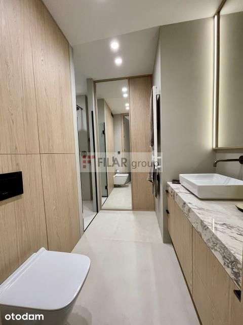 Apartament Dzielna 62, trzy pokoje garaż komórka l
