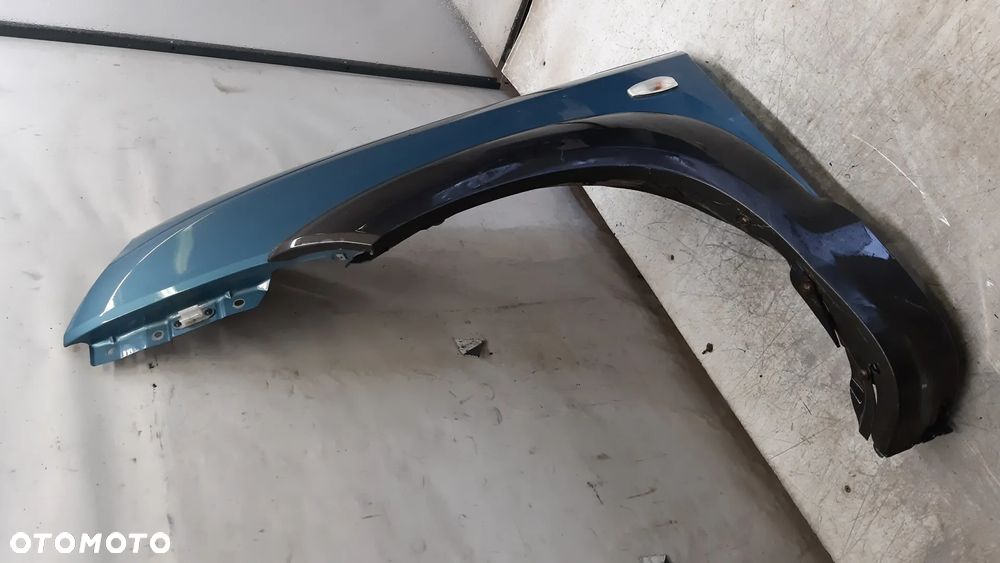 * Hyundai Tucson I 1 błotnik LEWY przedni przód MORSKI KOLOR HE - 2