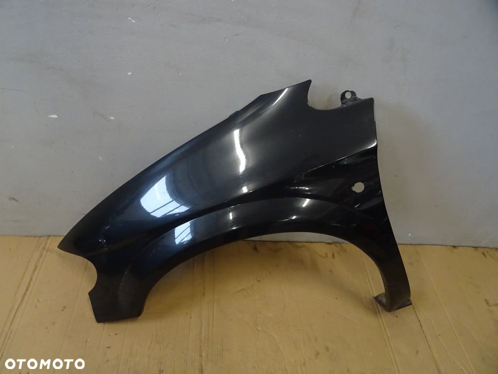 BŁOTNIK LEWY PRZÓD PRZEDNI CHRYSLER VOYAGER IV NR23 - 2