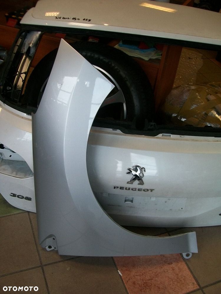 Błotnik przód przedni prawy Peugeot 308 - 1