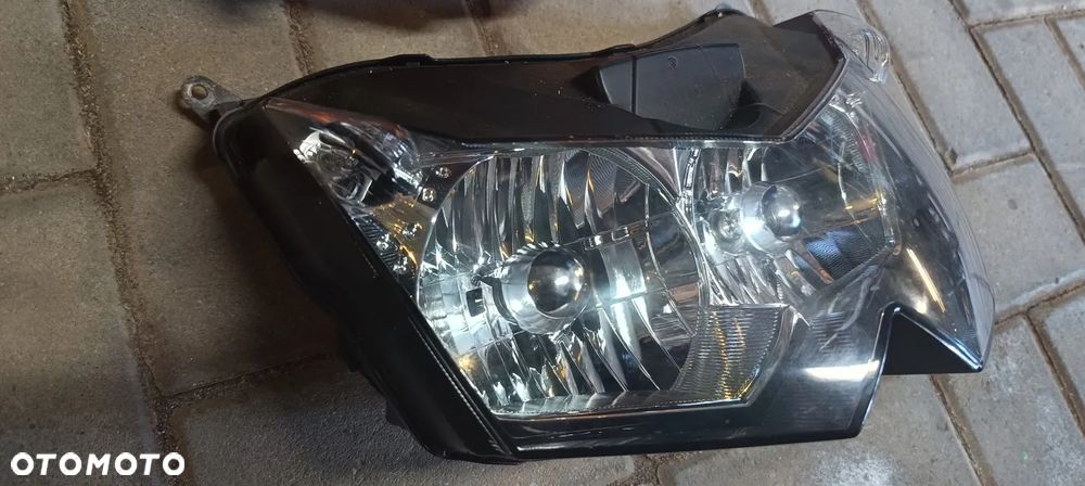 KAWASAKI Z1000 CZASZA OWIEWKA REFLEKTOR LAMPA PRZÓD07-09 - 10
