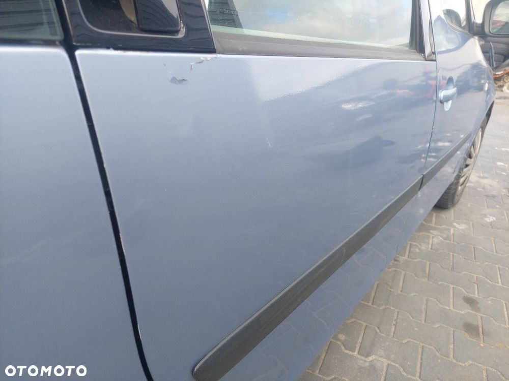 DRZWI KOMPLETNE PRAWY TYŁ SKODA ROOMSTER I LF5Y 06-10r - 2