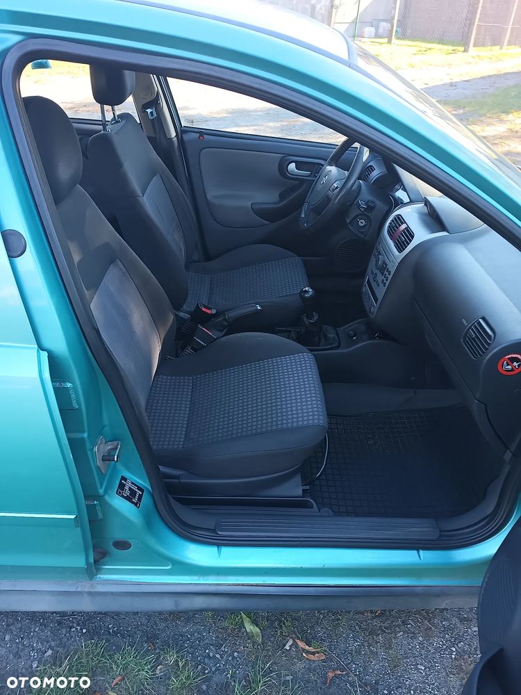 Opel Corsa 1.2 16V Enjoy - 11