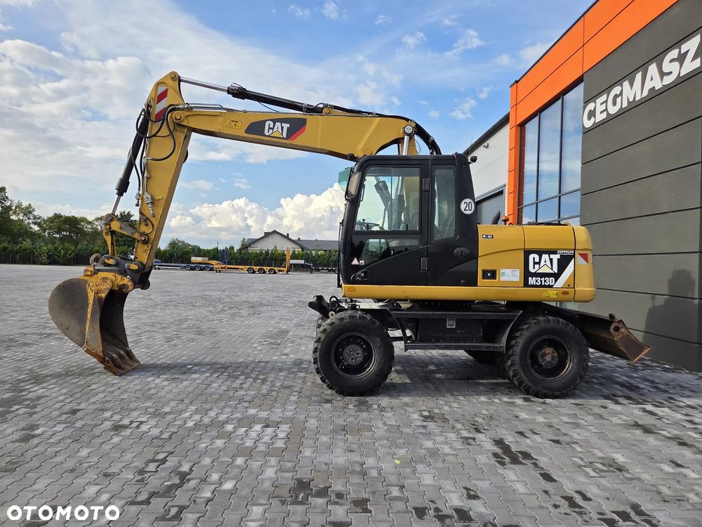 Caterpillar 313D / z Niemiec / - 2