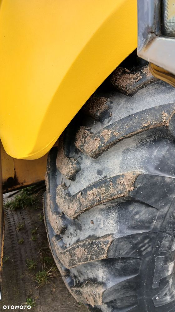 New Holland LB 115 - 21