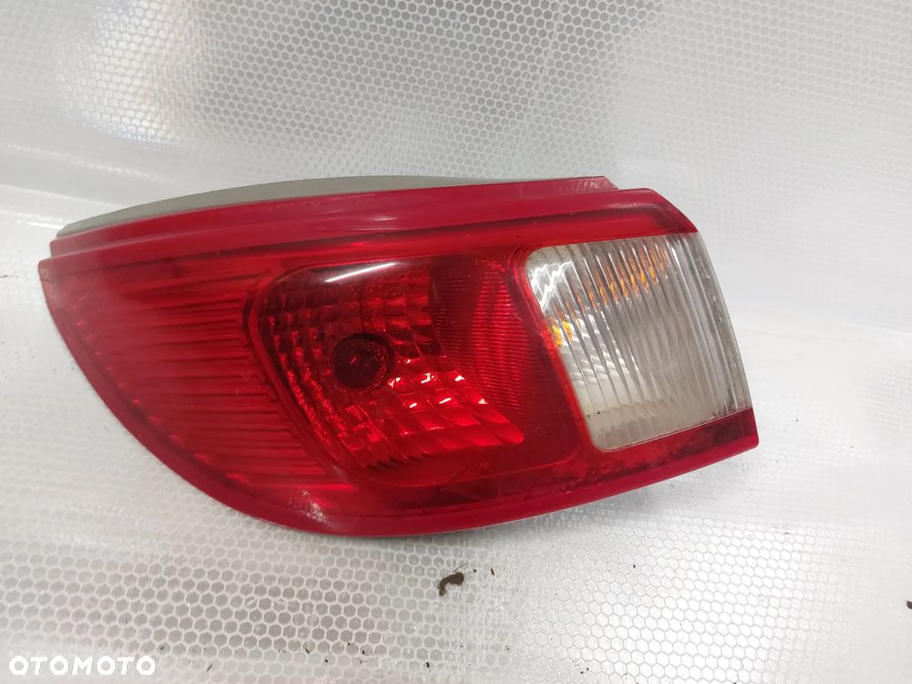 .  LAMPA TYL TYLNA LEWA MITSUBISHI COLT Z30 CABRIO