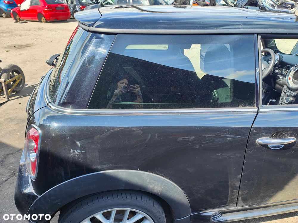 MINI COOPER R56 13r BŁOTNIK PRAWY TYŁ A94/9 - 1