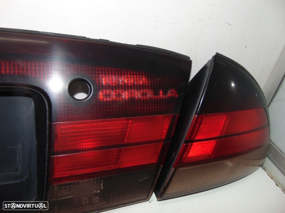 Toyota corolla xli farolins /Placa central - 6