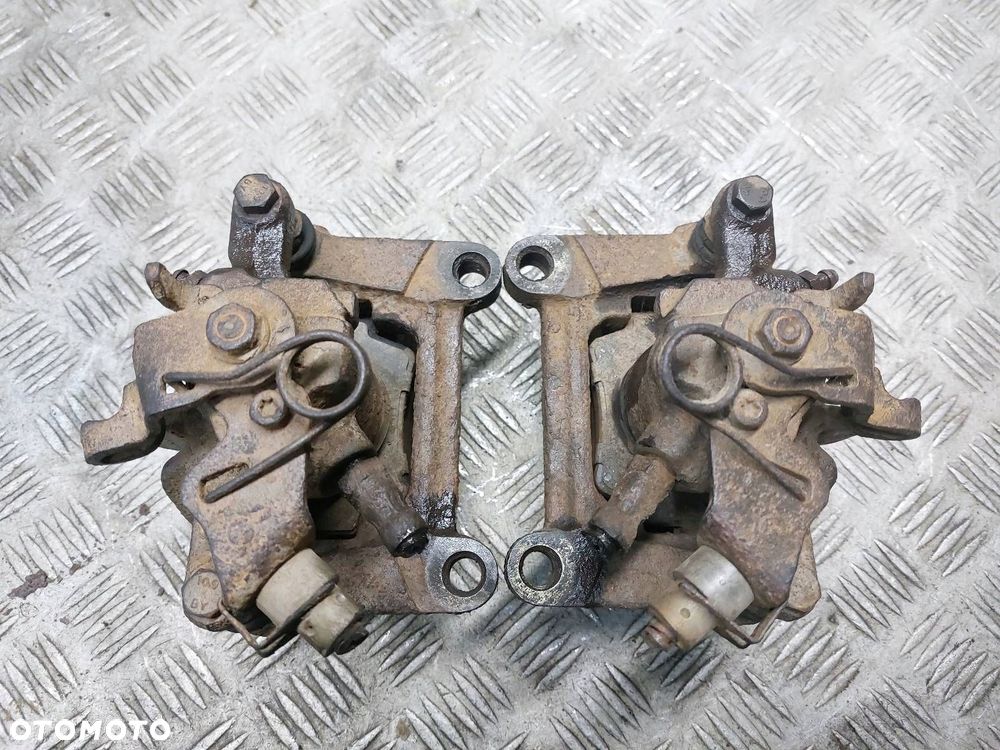 TARCZE HAMULCOWE TYŁ + ZACISKI VOLKSWAGEN TRANSPORTER T4 2.4 D - 10