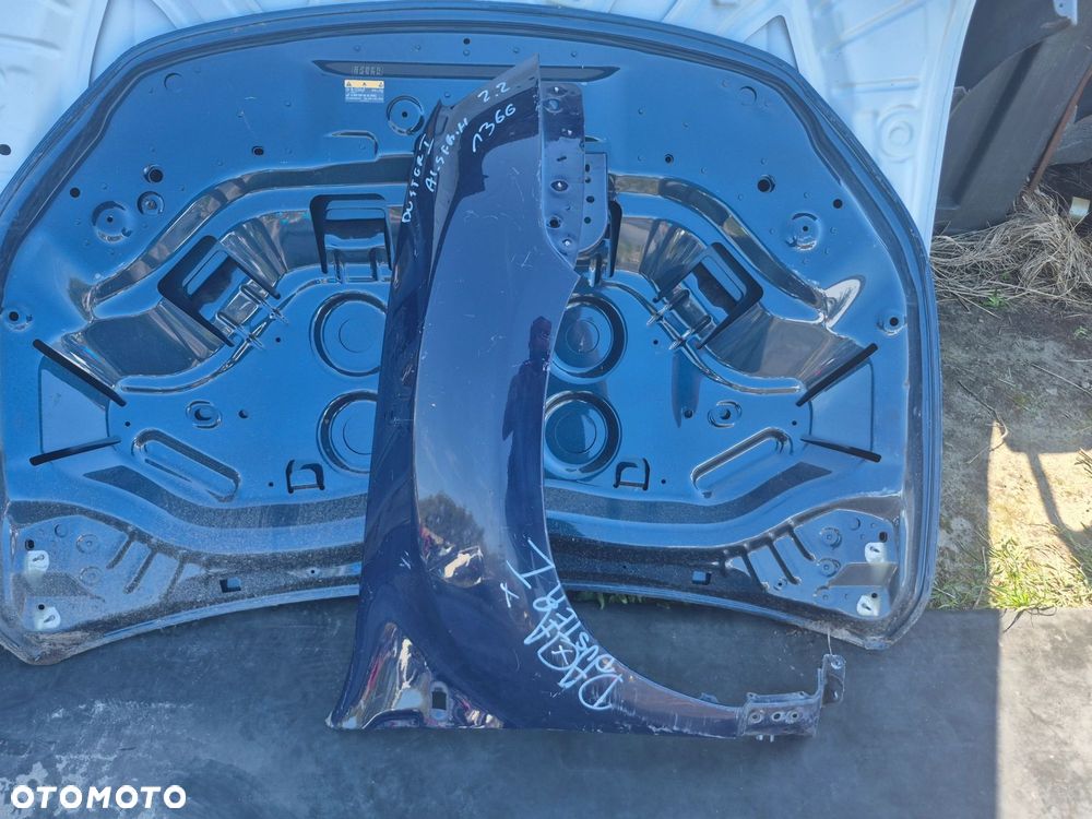 Błotnik Dacia Duster I 2010-2017r. Przód prawy - 1