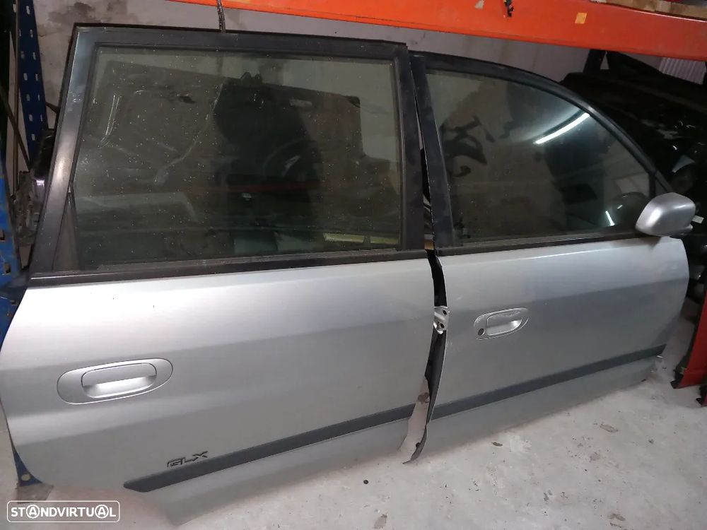 Portas completas lado condutor mitsubishi space star ano 2002 - 2