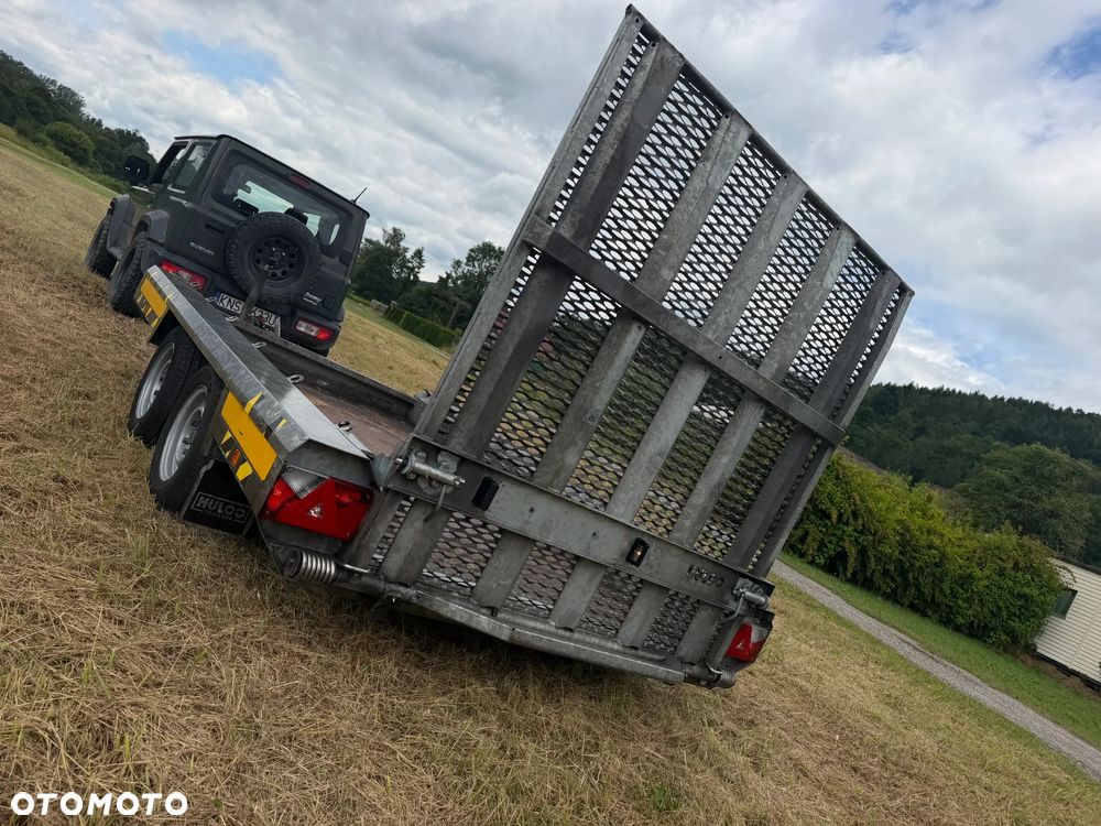 Inny Przyczepa Dwuosiowa Ciężarowa-LAWETA Do Koparek Maszyn Budowlanych. HULCO TERRAX-2 3001-LK.  NAJAZD Pełny Klapa z Bardzo mocnej konstrukcji. Lekki system otwierania najazdu jedną ręką! DMC 3000Kg! Jest To Laweta marki PREMIUM. Dwie ośie hamujące! Pełny ocynk. HULCO to Francuski Producent największy w Europie! Potężna jakość wykonania! Okazja Tanio. Laweta sprowadzona z Norwegii. Zero zużycia jak nówka sztuka! OKAZJA - 2