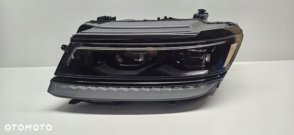 VW TIGUAN II 5NN ALLSPACE REFLEKTOR LEWY LAMPA LEWA CZARNA RAMKA