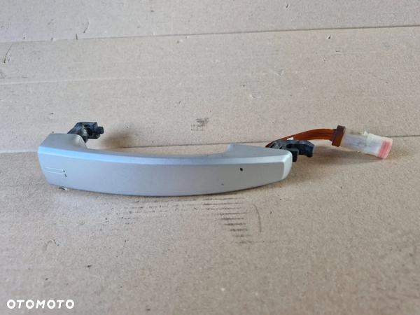 Klamka przód Opel Astra H III Zafira B keyless
