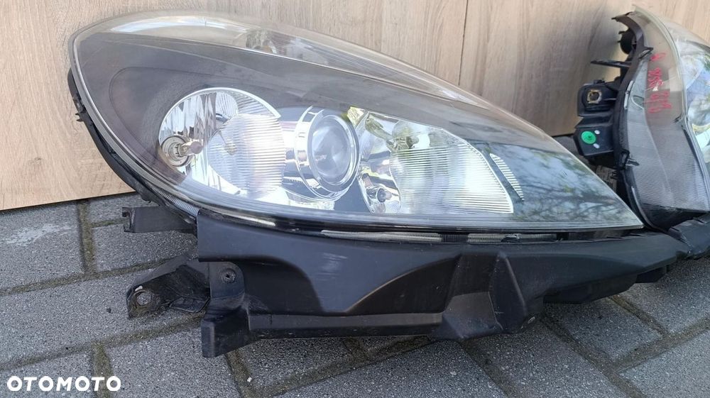 REFLEKTOR 2 LAMPY PRZÓD LEWA PRAWA EUROPA RENAULT CLIO III 3 8200261612 - 4