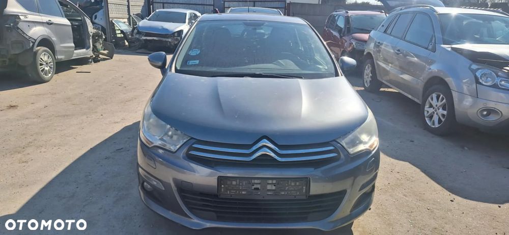 Citroen C4 II B7 lampa prawy przód - 1