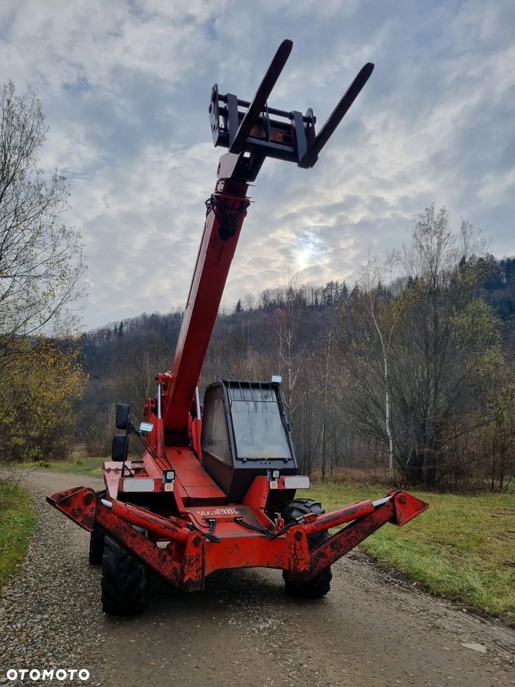 Manitou MT1230.SCP Ładowarka Teleskopowa z podporami 4x4. 13metrów Wysięg! Udzwig 3 tony. Silnik Perkins 4cyl. Import Norwegia! Perfekt stan! 3tryby skrętu. 4 biegi REWERS  Oryginał! Opony ładne. Potężna moc! - 39