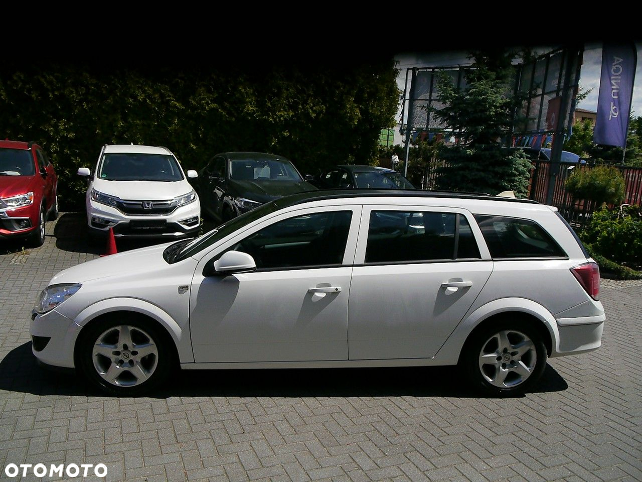 Opel Astra 1.6 Caravan Sport - 12