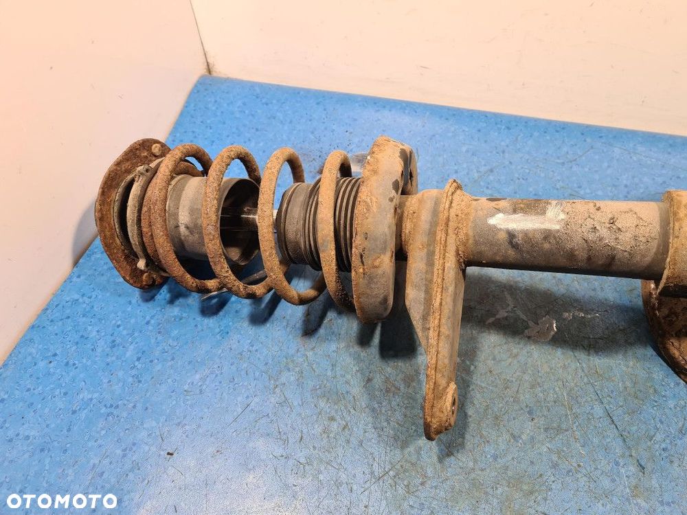 OPEL KADETT E LIFT AMORTYZATOR ZWROTNICA PRZÓD LEWY. - 7