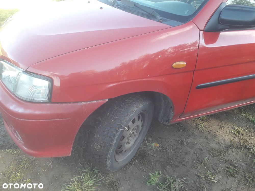 Mazda Demio 97-03 Drzwi prawe przednie tył błotnik w kolor SU  szyba zderzak lampaprzód - 9
