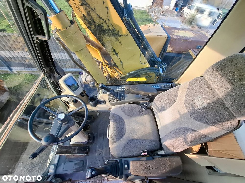 Caterpillar M313C - 15