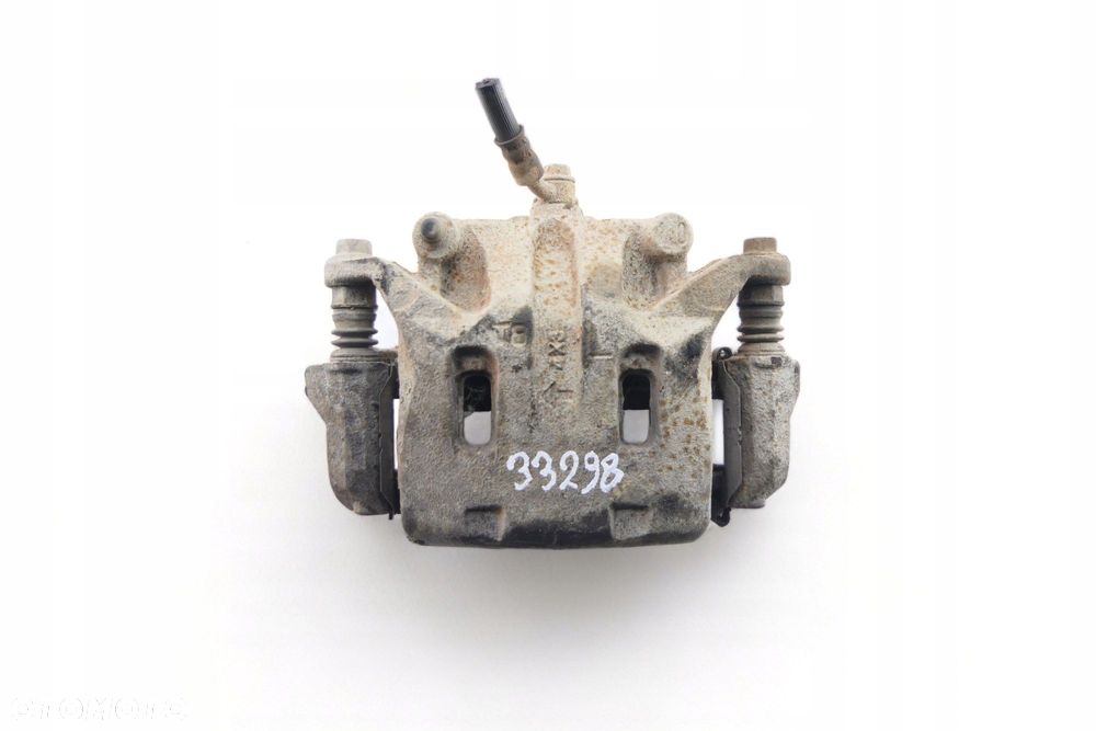 Zacisk Hamulcowy Lewy Przód NISSAN NAVARA 2.5 DCI 15r - 1