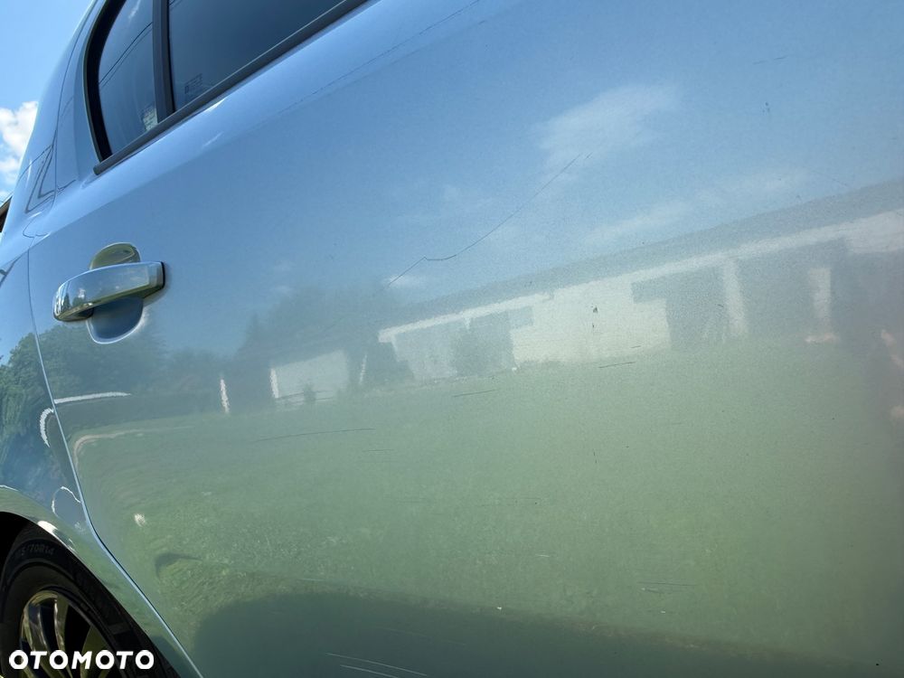 Opel Corsa 1.2 16V Cosmo - 11