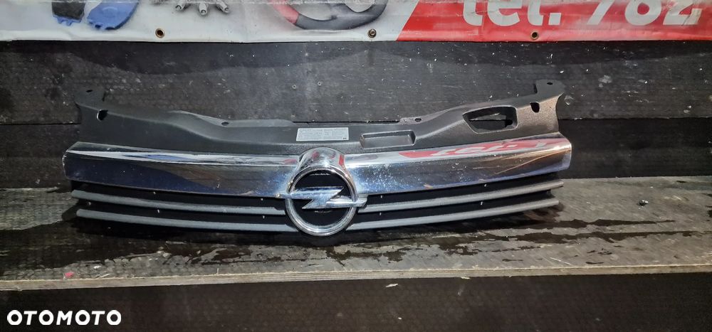 GRILL ATRAPA 13108463 OPEL ASTRA H III