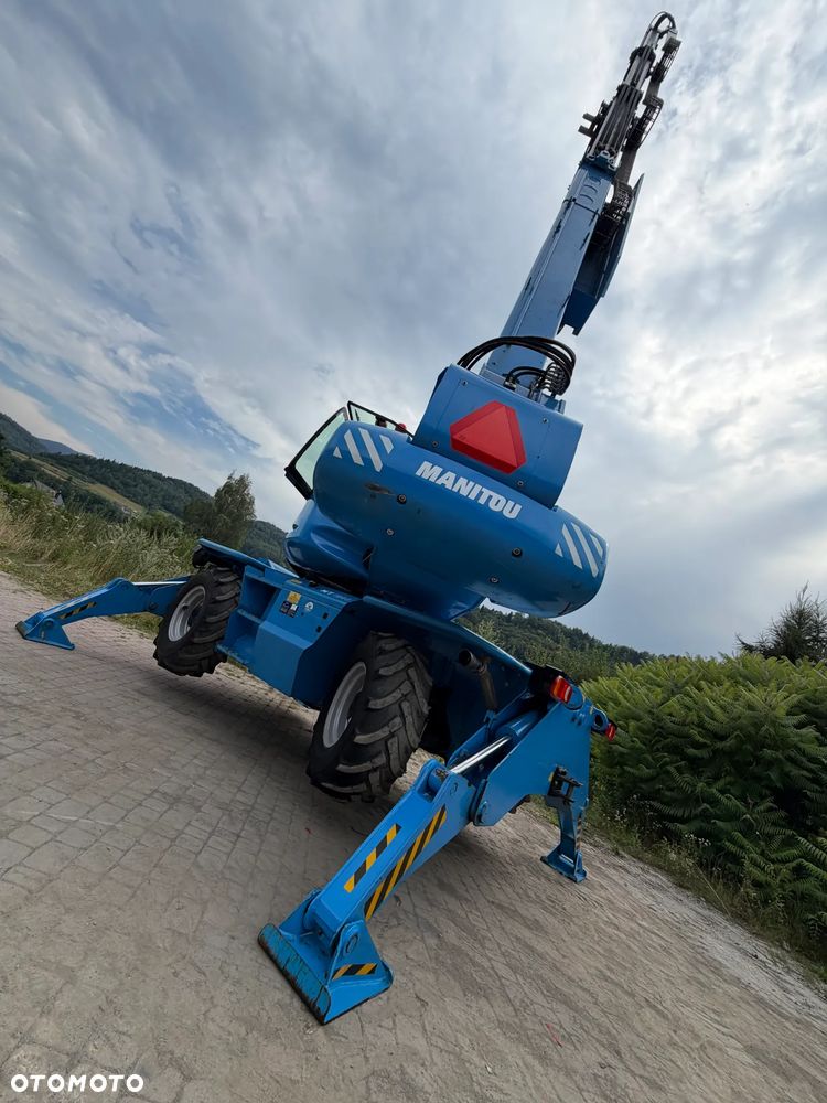 Manitou MRT 1840 Ładowarka Teleskopowa Obrotowa ROTO Dźwig Zwyżka 18 metrów wysuw. 4 tony Udźwig! Maszyna nie różni się od Nowej z Salonu! 2022rok, 1600 mtg.  Pilot zdalnego sterowania! Widły.  Aktualna DEKRA 2027 rok. skręt 4 koła KRAB. Auto-poziomowanie! małe gabaryty maszyny. Mała waga a potężny zasięg i udzwig! Pełna Dokumentacja do maszyny z serwisów CE itd! Maszyna po wszystkich Możliwych serwisach do 2027 roku. Wielka okazja. Ładowarka sprowadzona z Norwegii. Pracowała sporadycznie i lekko w urzędzie miejskim! Zerowe zużycie! - 31