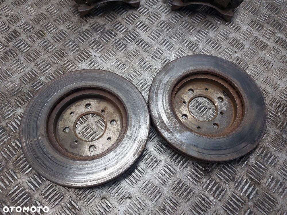 TARCZE HAMULCOWE PRZÓD + KLOCKI + ZACISKI HONDA CITY IV 1.4 16V - 2