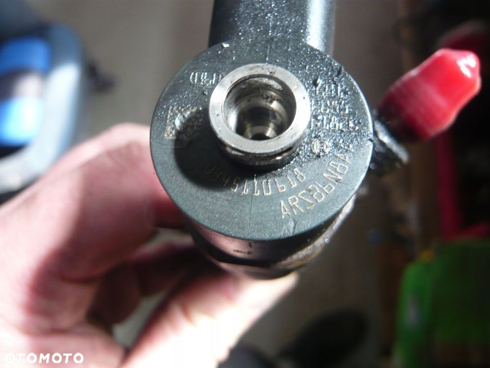 wtryskiwacz 0445110618 opel corsa e - 3