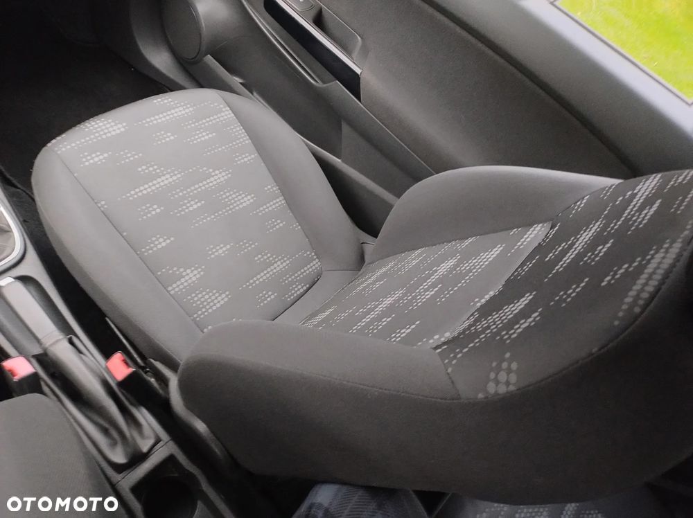 Opel Corsa 1.2 16V Enjoy - 25