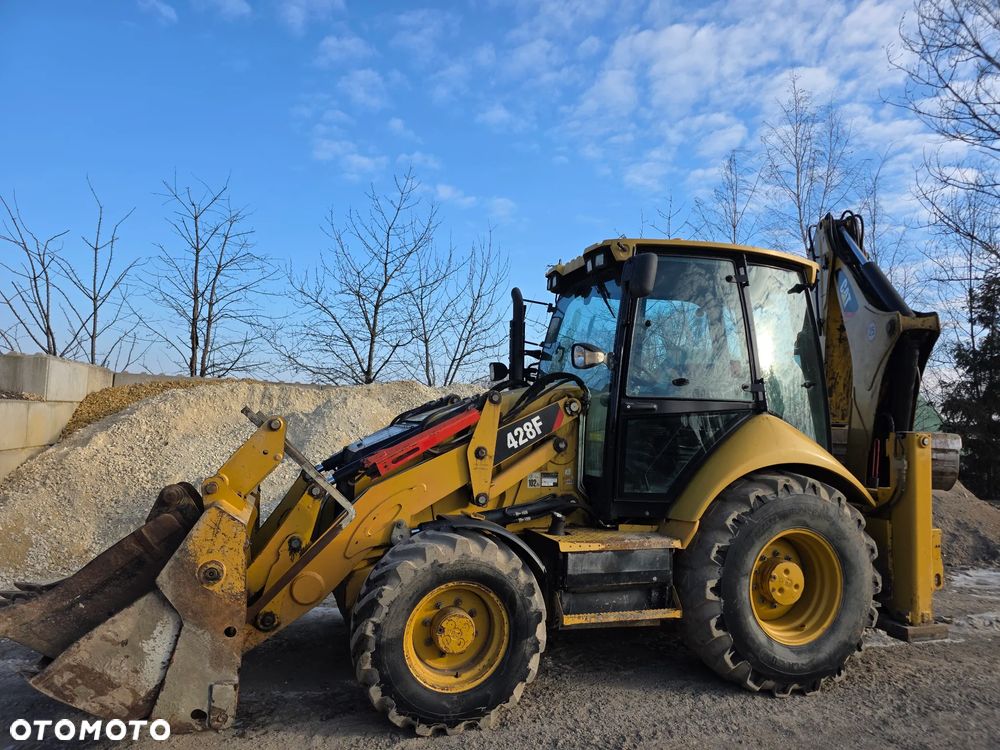 Caterpillar 428 - 1