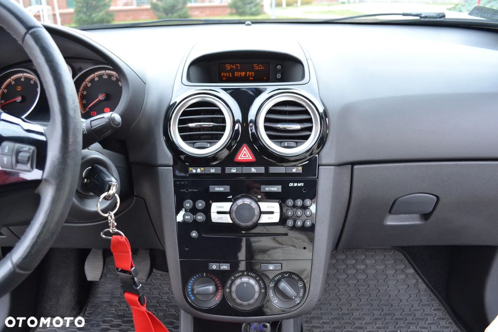 Opel Corsa 1.4 16V Enjoy - 13