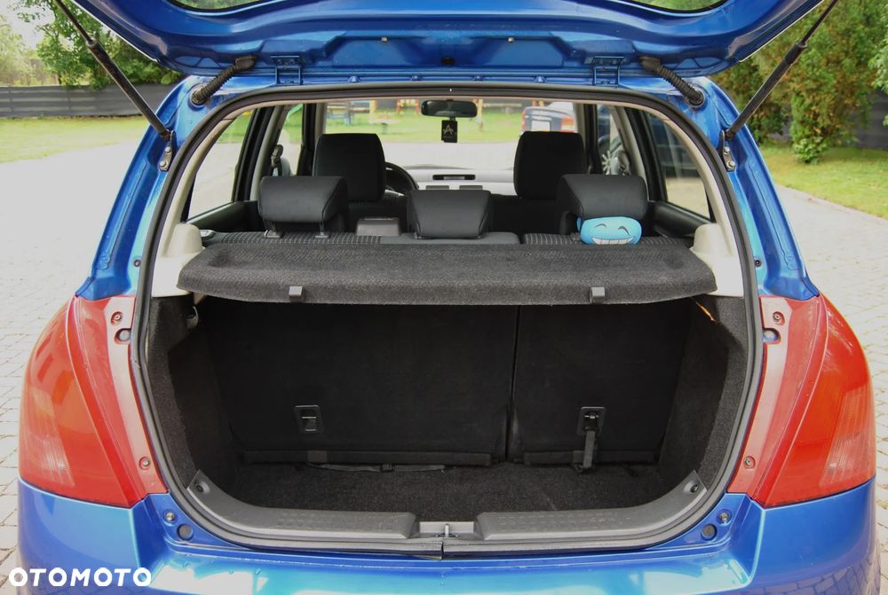 Suzuki Swift 1.3 Club - 12
