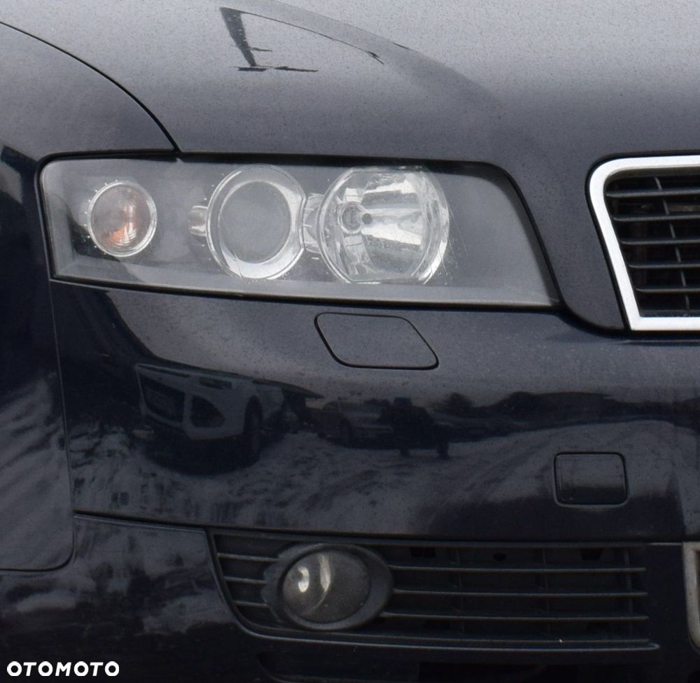Zaślepka spryskiwacza lampy AUDI A4 B6 KOLOR L / P - 9