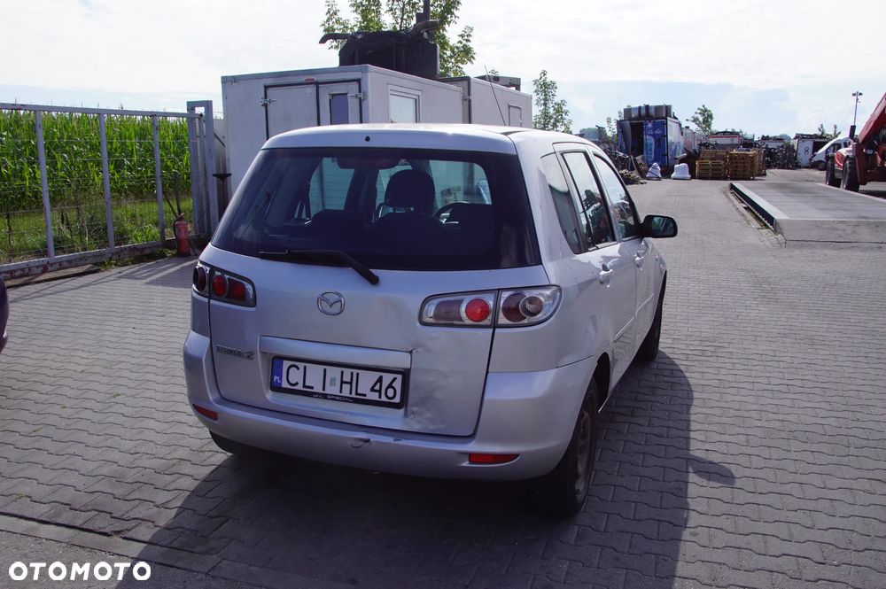 Auto na części - Mazda 2 DY Lift 1.4 CITD 67 KM F6JA 2N1R-7F096-AB 2006R Silnik Skrzynia Drzwi Szyba Lusterko Maska Klapa Lampa Zderzak Deska Kokpit Sterownik Moduł - 6