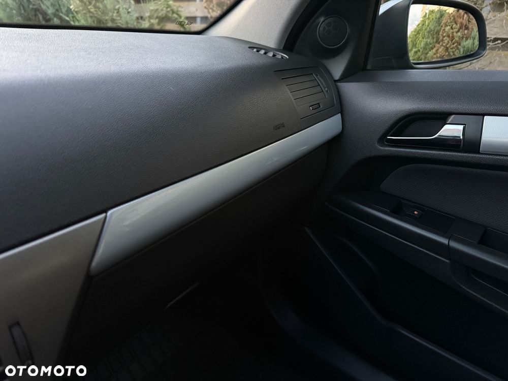 Opel Astra 1.4 NJoy - 23
