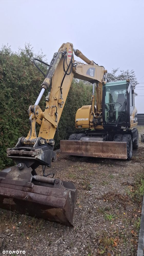 Caterpillar M313C - 2