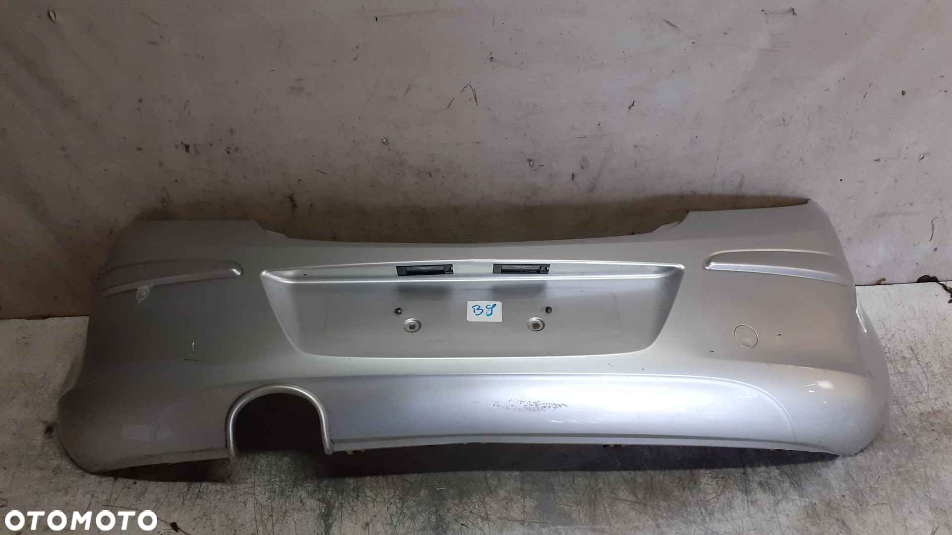 ^ ZDERZAK TYŁ TYLNY OPEL CORSA D Z157 SREBRNY - 1
