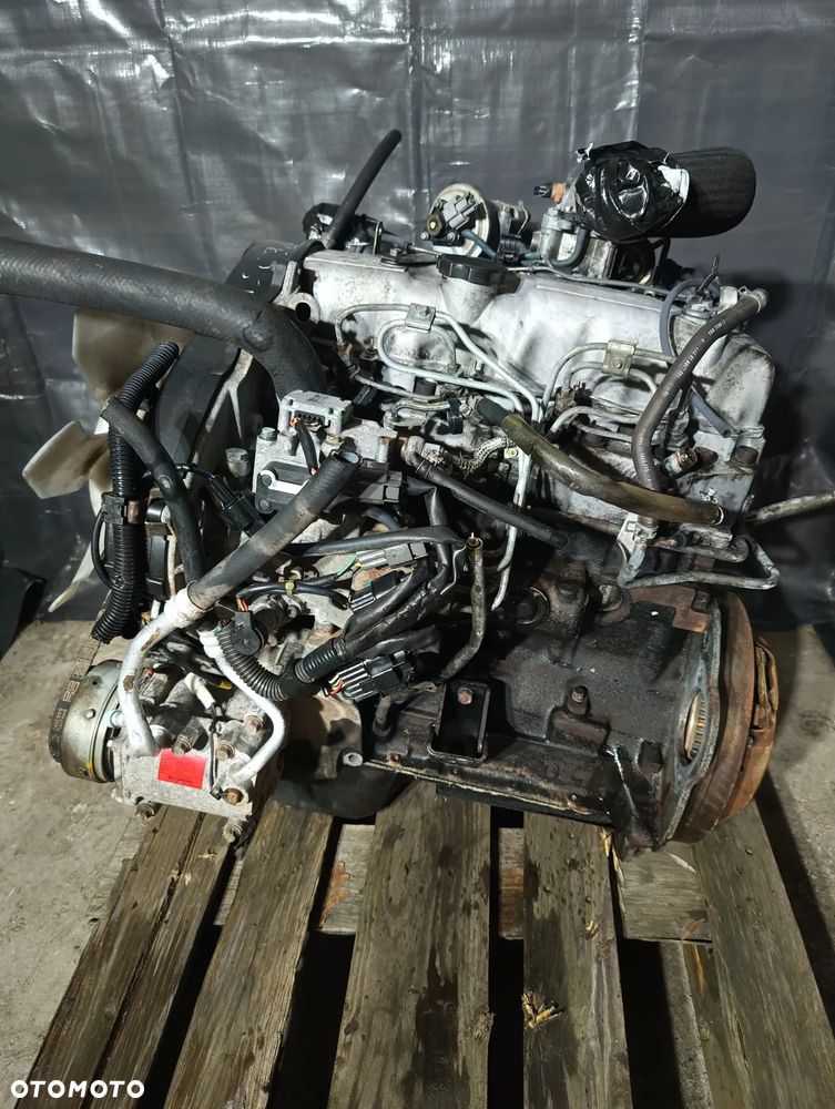 SILNIK 2.5 L200 PAJERO 4D56 02-06 ELEKTRONICZNA POMPA KOMPLETNY