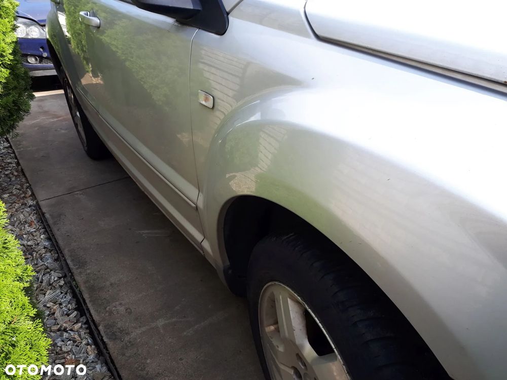 DODGE CALIBER 06-09 2.0 CRD OSŁONA PRZECIWSŁONECZNA PRAWA LEWA DASZEK SŁONECZNIK - 22